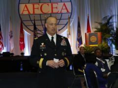 Lt. Gen. Alan R. Lynn, USA, director, Defense Information Systems Agency and commander, Joint Force Headquarters, Department of Defense Information Network, gives the keynote luncheon address amidst attendees at Defensive Cyber Operations Symposium 2016 in Washington, D.C.