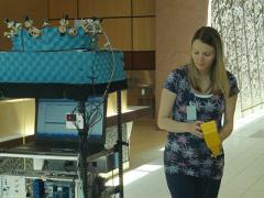 NIST researcher Jelena Senic drives a robot used to measure the performance of different antenna beam patterns. Photo Credit: NIST