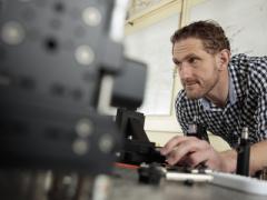 Michael Reimer, assistant professor of electrical and computer engineering at the University of Waterloo, aligns a quantum light source at the university’s Institute for Quantum Computing. Work performed at the institute could lead to quantum radar capable of seeing through high-energy interference as well as detecting stealth aircraft.