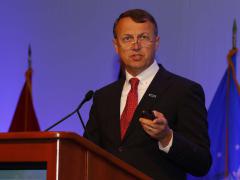 Maj. Gen. Earl Matthews, USAF, (Ret.), former director of cyberspace operations and chief information security officer for the Air Force, delivers the luncheon keynote during MILCOM 2016. Photo by Mike Carpenter