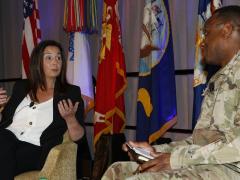 Jennifer Swanson, director, Software Engineering Center, Army Communications-Electronics Command (CECOM) and CW5 Linc McCoy, USA, CECOM’s command chief warrant officer, have a fireside chat during TechNet Augusta 2021.