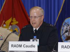 Rear Adm. Daryl Caudle, USN, commander, Submarine Forces, Pacific Fleet, speaks on a panel at West 2019. Photo by Michael Carpenter