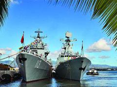 The People’s Liberation Army Navy (PLAN) Luhu-class destroyer Qingdao (l) and the Jiangkai-class frigate Linyi are moored at a dock while visiting Joint Base Pearl Harbor-Hickham in Hawaii in September. The newest PLAN destroyer, an 052D model, incorporates lessons learned from these ships alongside innovative technologies.