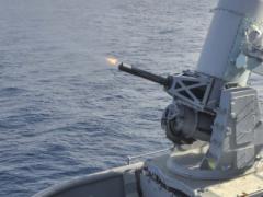The Phalanx close-in weapon system aboard the amphibious assault ship USS Boxer is a machine gun that can detect and automatically destroy incoming threats. The Defense Advanced Research Projects Agency has modified a contract to develop guided, medium-caliber ammunition for ship defense.