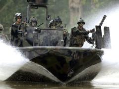 Special warfare combatant-craft crewmen transit the Salt River in northern Kentucky on the Special Operations Craft-Riverine during pre-deployment, live-fire training. FLIR Surveillance Inc. was awarded a contract for Combatant Craft Forward Looking Infrared variant 2.