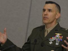 Brig. Gen. Dennis Crall, USMC, deputy principal cyber advisor, Office of the Secretary of Defense, speaks at the National Security Technology Forum and Exposition in San Diego. Photo by Michael Carpenter