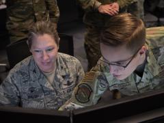 Col. Laurel Walsh, 50th Operations Group commander (l), and Airman 1st Class Michael McCowan, satellite systems operator and mission planner, 2nd Space Operations Squadron, give the final command to decommission Satellite Vehicle Number-36 at Schriever Air Force Base, Colorado in January. As part of steps to create a modern, agile U.S. Space Force, the new service is creating a data management governance council. Credit: U.S. Air Force photo by Airman Amanda Lovelace