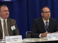 Karl Kurz, DISA Unified Capabilities Portfolio (l) and Kevin Tate of the DOD Office of the Chief Information Officer discuss the Defense Enterprise Office Solutions during a panel at TechNet Cyber.