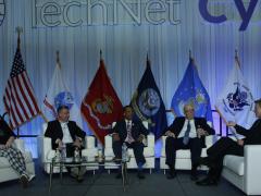 DISA officials discuss the agency’s priorities during a panel discussion at AFCEA’s TechNet Cyber 2022. Photo by Michael Carpenter