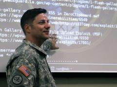 A Louisiana Army National Guard chief communications plans officer trains members of the Cyber Defense Incident Response Team to defend the state’s cyber assets in November 2015. Photo courtesy DOD