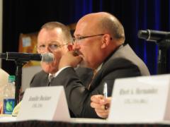 Gary Martin (c), program executive officer for command, control and communications-tactical (PEO C3T), discusses convergence at AFCEA's TechNet Augusta 2015 conference.