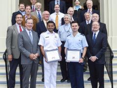 Attending the NPS ceremony recognizing AFCEA academic award winners are Adm. Mike Mullen, USN (Ret.) (front row, left), former chairman of the Joint Chiefs of Staff, and Gen. Keith Alexander, USA (Ret.) (front row, right), former director of the National Security Agency.