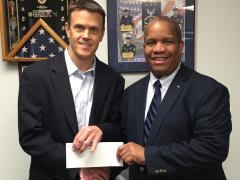 Matt Stratford, managing principal, BridgePhase LLC (l), presents a $3,000 check to AFCEA Educational Foundation Executive Director Vince Patton to sponsor the 2016 BridgePhase STEM Major Scholarship.