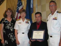 Christopher Piazza (c) is presented the AFCEA STEM Major scholarship award.