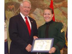 Lt. Gen. John A. Dubia, USA (Ret.), former executive vice president of AFCEA International, presents Kimberly Nicole Denny of Jacksonville, Florida, the first AFCEA Lt. Gen. John A. Dubia, USA (Ret.), Scholarship in November 2014. Cadet Denny is a junior at Mary Baldwin College in Staunton, Virginia, and participates in the ROTC program at nearby Virginia Military Institute, Lexington, Virginia.