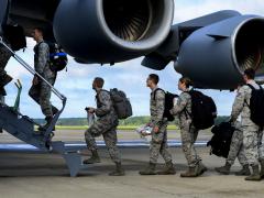 U.S. Air Force troops from the 633rd Medical Group load onto a C-17 Globemaster at Langley Air Force Base, Virginia, on September 26. They packaged and delivered a modular medical treatment center as part of a U.S. government-wide effort to support humanitarian relief operations in Ebola-stricken West African nations.