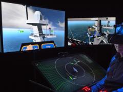 Scientist Arne Odland works in the Battlespace Exploitation of Mixed Reality (BEMR) laboratory at the Space and Naval Warfare Systems Center Pacific (SSC Pacific). BEMR’s use of mixed reality technology in training applications is helping the Navy cut costs and reduce risks. Alan Antczak