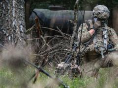 A 173rd Airborne Brigade soldier conducts a radio check during an exercise at the Hohenfels Training Area, Germany. New satellites will extend the range of many tactical communications systems beyond line of sight, providing global reach. Sgt. Henry Villarama, USA