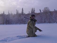 An Alaska Air National Guard tech sergeant tests his radio communications in harsh conditions. The Defense Information Systems Agency (DISA) is speeding up efforts to incorporate transformational technologies into all aspects of defense information systems. U.S. Air Force