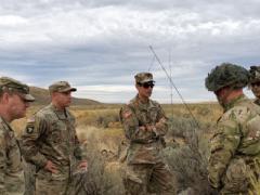 Lt. Col. Brian Wong, USA, chief of market research for the Army’s Network Cross Functional Team (c), assesses the waveform strength of several mobile ad hoc network radio signals during a Rapid Innovation Fund capstone event in 2019 in Yakima, Washington. Engineers at Johns Hopkins’ Applied Research Lab are looking into how to build a large scale network of intelligent radios, among other tactical communications efforts. USA/PEO C3T Public Affairs