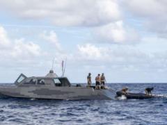 Sailors deployed with the expeditionary mine countermeasures capability of Task Force 75 and Special Warfare Combatant-Craft Crewmen recover a MK 18 Mod 2 unmanned underwater vehicle (UUV) onto a combatant craft in Pago Bay, Guam in November. The Navy is working to add considerable unmanned capability to the fleet with UUVs and unmanned surface vehicles of all sizes to support a number of naval missions. U.S. Navy photo by Petty Officer 1st Class Adam Brock
