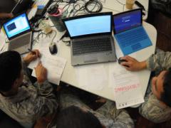 Hawaii Air National Guardsmen evaluate network vulnerabilities during the Po‘oihe 2015 cybersecurity exercise at the University of Hawaii’s Information Technology Center. The cybersecurity exercise is part of a hurricane preparedness effort that encompasses several state and federal government organizations.