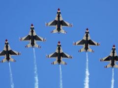 The U.S. Air Force Thunderbirds perform a six-ship formation flyover during an air show. Researchers want to know which indicators of personal performance—heart rate or body sway, for example—begin to synchronize when a team works well together.