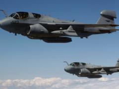 Two EA-6B Prowler electronic warfare aircraft fly over Turkey to support combined task force operations. The analog-to-digital converter chip being developed by DARPA ultimately could benefit a wide range of communications, radar and electronic warfare systems.