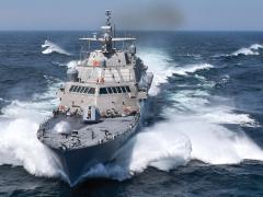 The USS Detroit (LCS 7) conducts acceptance trials, the last significant milestone before delivery to the Navy, in 2016. The Information Warfare Research Project was inspired in part by the National Shipbuilding Research Program initiated in 1971.