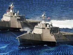 The littoral combat ships USS Independence, back, and USS Coronado travel together in the Pacific Ocean. One of the Defense Department’s primary cybersecurity concerns is that adversaries can hack into industry networks and steal secrets about developing weapon systems. U.S. Navy photo by Chief Mass Communication Specialist Keith DeVinney/Released