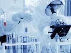 Department of Homeland Security scientists serve as the first line of defense against the COVID-19 pandemic. Mongkolchon Akesin/Shutterstock