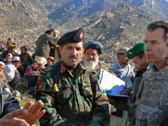 Col. Greg Julian, USA, public affairs officer for the U.S. Forces Afghanistan, leads an investigation team to meet with villagers in Tagab, Afghanistan. The team worked with the Afghan ministries of Defense and Information to explore allegations of possible civilian casualties after a mission to capture Taliban leaders.
