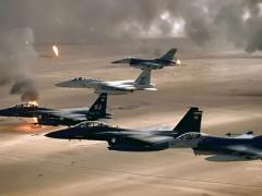U.S. Air Force aircraft of the 4th Fighter Wing fly over Kuwaiti oil fires set by the retreating Iraqi army during Operation Desert Storm in 1991. NATO air power has not been challenged in recent conflicts, but with resources and capabilities dwindling, NATO officials are sounding warning bells about the future.