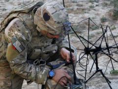 A U.S. Army soldier with the 101st Airborne Division sets up radio communications inside an abandoned fortress in Afghanistan’s Parwan province. Warfighters’ lives often depend on adequate access to radio spectrum. An NSF effort to improve spectrum access will benefit all users, including military, government and industry.