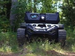 The Ripsaw M5 robotic combat vehicle developed by a team made up ofTextron, Howe & Howe, and FLIR Systems, is one of two robotic systems being developed for the Army's manned-unmanned teaming concept. The other is the a light robotic vehicle being developed by QinetiQ and Pratt and Miller. The service is conducting a series of experiments to test the concept using surrogate vehicles while the robotic systems are in development. Photo courtesy of Textron