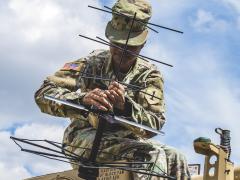 A soldier helps set up a tactical command post to test communications in Germany, July 8, 2019. The Army is releasing a flurry of documents, including a pending posture statement, outlining its modernization plans for 2035. Credit: Army Sgt. Patrick Jubrey