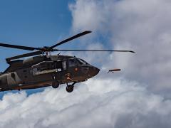 An Area-I Air-Launched, Tube-Integrated, Unmanned System, or ALTIUS, is launched from a UH-60 Black Hawk at Yuma Proving Ground, Arizona, March 4 where the U.S. Army Combat Capabilities Development Command Aviation & Missile Center led a demonstration that highlighted the forward air launch of the ALTIUS. Courtesy photo provided by Yuma Proving Ground