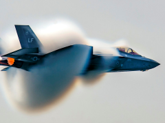 Air Force Capt. Andrew "Dojo" Olson, commander of the F-35 Heritage Flight Team, performs a high-speed pass during the Canadian International Air Show in Toronto, Sept. 1, 2018. The F-35 program office intends to award rapid development contractors to small businesses to rapidly develop and deliver an array of technologies for the aircraft. Photo by Airman 1st Class Alexander Cook