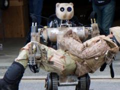 An all-terrain, search-and-rescue humanoid robot at Fort Detrick, Maryland, simulates how a soldier or item up to 500 pounds can be lifted and carried and how it can grasp fragile objects without damaging them. Unmanned systems of the future may be the first to encounter enemy fire.