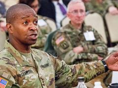 Lt. Gen. Bruce Crawford, USA, Army chief information officer/G-6, engages the audience at the AFCEA Army Signal Conference in Springfield, Virginia. To modernize for the future, the Army is undergoing significant changes now, Gen. Crawford and other Army leaders indicate.