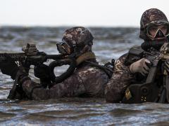 Navy SEALs conduct train in the Atlantic Ocean, May 29, 2019. Navy Special Warfare Command expects artificial intelligence to augment the human weapon system as well as unmanned systems. Credit: Navy Senior Chief Petty Officer Jayme Pastoric