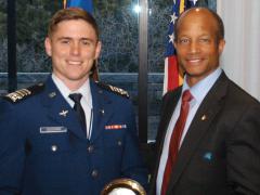 Cadet Jacob Goodwin (l), U.S. Air Force Academy, receives the Lt. Gen. Gordon T. Gould Jr., USAF, Honor Award from Col. Robert Wright, USAF (Ret.). This commissioning award at the Air Force Academy was named after Gen. Gould in 1983. He was an electronics engineer who graduated from the U.S. Military Academy in 1941 and was instrumental in enhancing the communications career field, giving it the recognition it deserved.