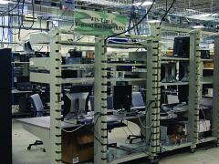Racks of gear provide Warfighter Information Network-Tactical (WIN-T) capability for the JOIN facility. The network can debug software upgrades as well as resolve interoperability issues.