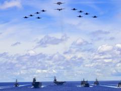 U.S., Australian and Japanese forces participate in a trilateral exercise dedicated to a free and open Pacific. These and other nations are worried about China's aggression in the wake of the Middle Kingdom reneging on its 50-year promise of economic and political autonomy to Hong Kong. Credit: U.S. Navy photo