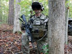 A soldier dons the Capability Set 3 (CS 3) militarized form factor prototype of the Integrated Visual Augmentation System (IVAS) during a Soldier Touchpoint 3 live fire test event at Fort Pickett, Virginia, in October 2020. U.S. Army photo by Courtney Bacon