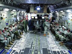 The full Joint Airborne Command and Control/Command Post (JACC/CP) system, which consists of four pallets with seats and work stations for as many as 16 users, sits in the cargo hold of a C-17 with soldiers deploying to a distant operation. Unlike the C-130, both ground troops (paratroopers) and battle staff can occupy the aircraft simultaneously with the JACC/CP.