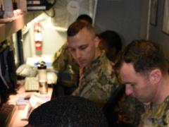 U.S. Army soldiers in a Joint Tactical Ground Station (JTAGS) at Osan Air Base, Korea, stand ready to provide early warning of missile launches. JTAGS units run by the Army Space and Missile Defense Command (SMDC) defend U.S. forces worldwide. U.S. Army photo