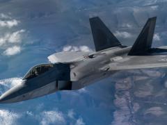 The Air Force’s Air Combat Command, newly in charge of the service’s Cyber Mission, is deploying specialized mission defense teams to protect particular weapon systems such as an F-22, pictured flying over Alaska during an exercise in May, or an F-35 or a key infrastructure component such as an air operations center. Credit: U.S. Air Force photo by Staff Sgt. Micaiah Anthony
