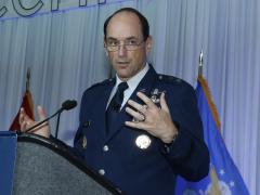 Maj. Gen. Kevin Kennedy, USAF, director of operations, U.S. Cyber Command, discusses the Joint Cyber Warfighting Architecture during a keynote presentation at TechNet Cyber 2022. Photo by Michael Carpenter