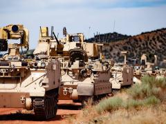 At Fort Carson, Colorado, modified Bradley Fighting Vehicles, known as Mission Enabling Technologies Demonstrators, and modified M113 tracked armored personnel carriers, or Robotic Combat Vehicles, were used for the Soldier Operational Experimentation (SOE) Phase 1 to further develop learning objectives for the Manned Unmanned Teaming (MUM-T) concept. Credit: Jerome Aliotta, CCDC Ground Vehicle Systems Center